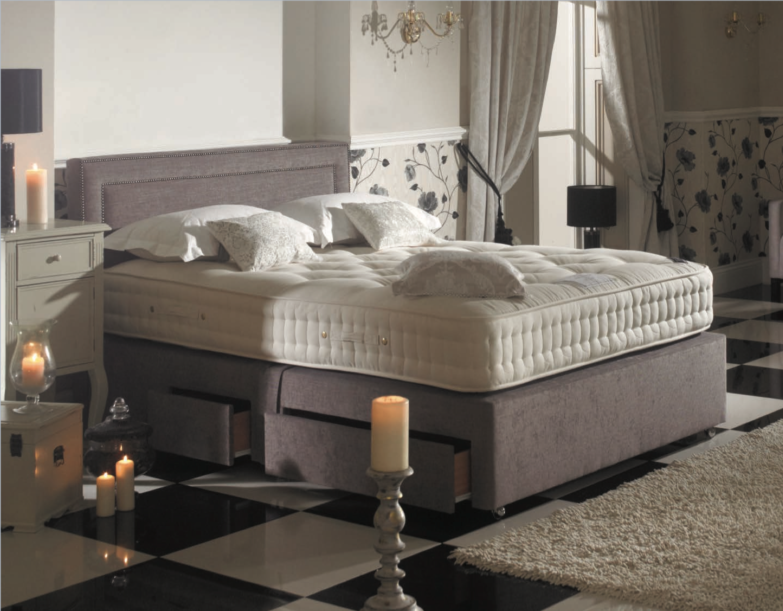 Grey 4 drawer divan base with studded headboard and mattress
